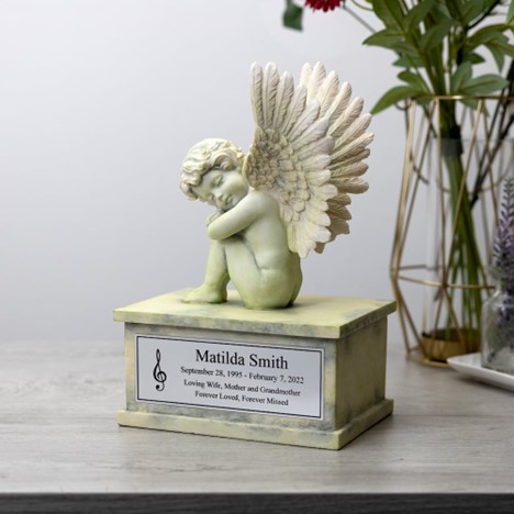 Baby angel cremation urn.