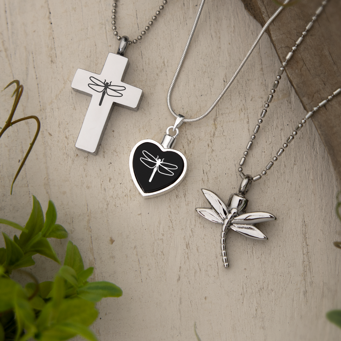 Variety of sterling silver cremation jewelry.